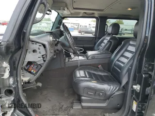 2005 Hummer H2 SUV with VIN 5GRGN23UX5H115383, listed as a Copart auction lot 71682984 with 157,405 mi miles and Salvage Title. Bid and sale history available at carsss.com. Image 7.