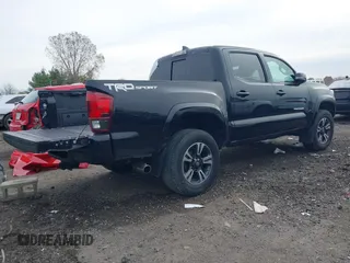 2018 Toyota Tacoma SR5 with VIN 3TMAZ5CN6JM055632, listed as a IAAI auction lot 40751593 with 125,663 mi miles and . Bid and sale history available at DreamBid. Image 4.