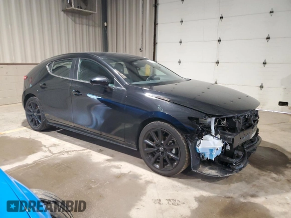 2024 Mazda 3 S Select Sport with VIN JM1BPAKMXR1718852, listed as a Copart auction lot 61240255 with 6,748 mi miles and Salvage title. Bid and sale history available at DreamBid. Image 4.