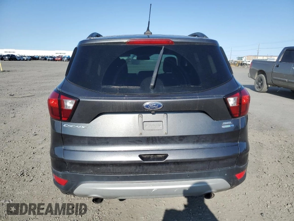 2019 Ford Escape SEL with VIN 1FMCU9HD7KUB29051, listed as a Copart auction lot 54121865 with 100,956 mi miles and Clean Title. Bid and sale history available at DreamBid. Image 6.