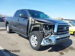 2012 Toyota Tundra z VIN 5TFUY5F14CX211124, wystawiony jako IAAI lot #42335278 z przebiegiem 139 269 mil mil oraz . Historia ofert i sprzedaży dostępna na DreamBid. Obrazek 1.