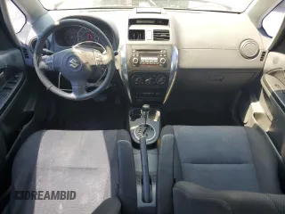 2009 Suzuki SX4 Sport FWD z VIN JS2YC414796203079, wystawiony jako Copart lot #57280845 z przebiegiem 170 213 mil mil oraz Szkody całkowita. Historia ofert i sprzedaży dostępna na DreamBid. Obrazek 8.