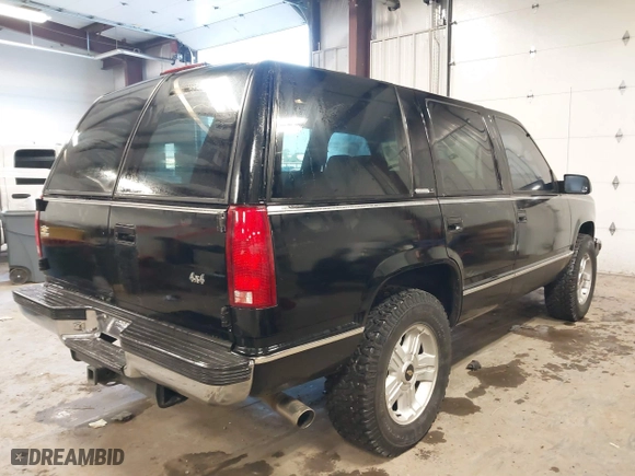 1996 Chevrolet Tahoe with VIN 1GNEK13R8TJ313125, listed as a IAAI auction lot 41361170 with 162,789 mi miles. Bid and sale history available at carsss.com. Image 4.