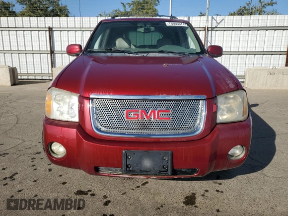 2006 GMC Envoy Denali with VIN 1GKES63M762237958, listed as a Copart auction lot 76999574 with 180,294 mi miles and Clean Title. Bid and sale history available at carsss.com. Image 5.