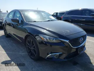 2016 Mazda Mazda6 i Grand Touring with VIN JM1GJ1W59G1438962, listed as a IAAI auction lot 41965478 with 196,935 mi miles. Bid and sale history available at carsss.com. Image 1.