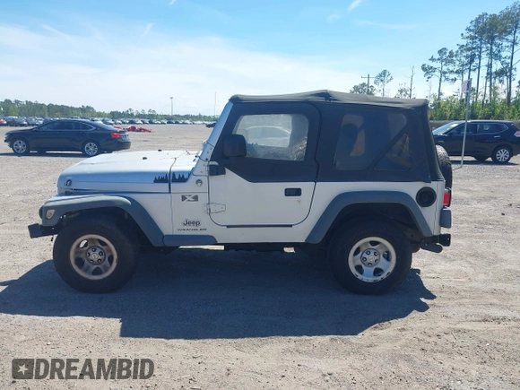 2006 Jeep Wrangler X with VIN 1J4FA39S86P743660, listed as a IAAI auction lot 41890339 with 198,099 mi miles and . Bid and sale history available at DreamBid. Image 14.