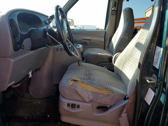 2000 Ford Econoline Passenger XL with VIN 1FMRE11L9YHB19715, listed as a Copart auction lot 69192734 with 237,129 mi miles and Salvage title. Bid and sale history available at DreamBid. Image 7.