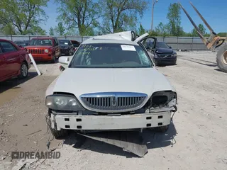 2004 Lincoln LS Luxury z VIN 1LNHM86S44Y630315, wystawiony jako IAAI lot #42136361 z przebiegiem 137 994 mil mil oraz . Historia ofert i sprzedaży dostępna na DreamBid. Obrazek 13.