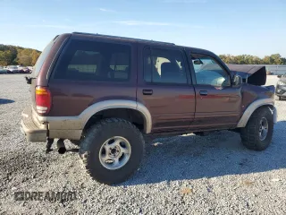 2000 Ford Explorer Eddie Bauer z VIN 1FMDU84P0YZB89831, wystawiony jako Copart lot #77874224 z przebiegiem 209 532 mil mil oraz Szkoda całkowita • Salvage title. Historia ofert i sprzedaży dostępna na DreamBid. Obrazek 3.