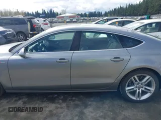 2014 Audi A7 Premium Plus z VIN WAUWGAFC4EN160144, wystawiony jako IAAI lot #41970181 z przebiegiem 118 761 mil mil oraz . Historia ofert i sprzedaży dostępna na DreamBid. Obrazek 14.