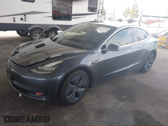 2020 Tesla Model 3 Standard Range Plus with VIN 5YJ3E1EA8LF743405, listed as a IAAI auction lot 41923592 with 81,901 mi miles. Bid and sale history available at carsss.com. Image 17.