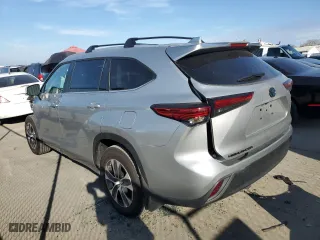 2023 Toyota Highlander Hybrid XLE with VIN 5TDKBRCH3PS601659, listed as a Copart auction lot 87937795 with 18,042 mi miles and Salvage Title. Bid and sale history available at carsss.com. Image 2.
