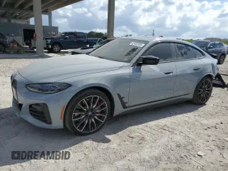 2023 BMW i4 M50 with VIN WBY33AW04PFP53795, listed as a Copart auction lot 42402505 with 20,210 mi miles and Salvage Title. Bid and sale history available at carsss.com. Image 1.