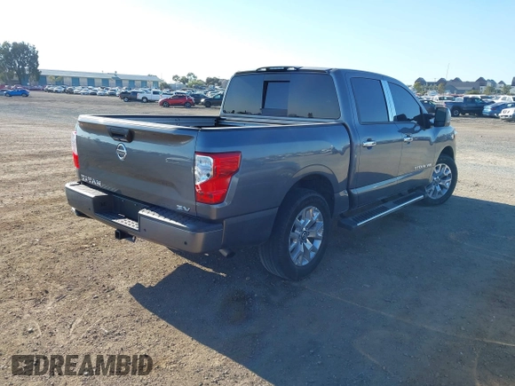 2020 Nissan Titan Platinum Reserve with VIN 1N6AA1EF8LN512582, listed as a IAAI auction lot 42236611 with 18,375 mi miles and . Bid and sale history available at DreamBid. Image 4.