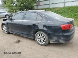 2014 Volkswagen Jetta SE z VIN 3VWD07AJ7EM220416, wystawiony jako Copart lot #60397265 z przebiegiem 184 854 mil mil oraz Czysty tytuł • Clean title. Historia ofert i sprzedaży dostępna na DreamBid. Obrazek 2.