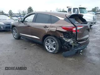 2019 Acura RDX w/Advance Pkg with VIN 5J8TC2H75KL017199, listed as a IAAI auction lot 41565130 with 67,880 mi miles. Bid and sale history available at carsss.com. Image 3.