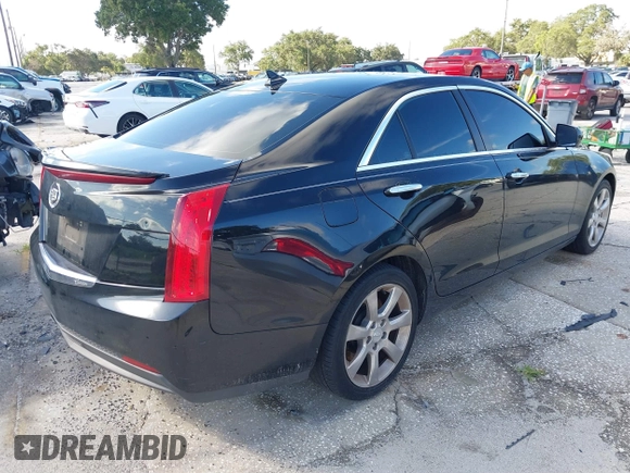 2014 Cadillac ATS Standard RWD z VIN 1G6AA5RA6E0146052, wystawiony jako IAAI lot #40220255 z przebiegiem 128 569 mil mil oraz . Historia ofert i sprzedaży dostępna na DreamBid. Obrazek 4.