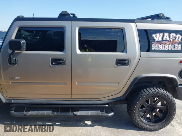 2003 Hummer H2 with VIN 5GRGN23U43H125114, listed as a IAAI auction lot 42160986 with 157,776 mi miles. Bid and sale history available at carsss.com. Image 14.