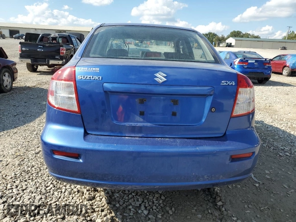 2012 Suzuki SX4 LE with VIN JS2YC5A31C6303361, listed as a Copart auction lot 74329394 with 136,420 mi miles and Salvage Title. Bid and sale history available at carsss.com. Image 6.