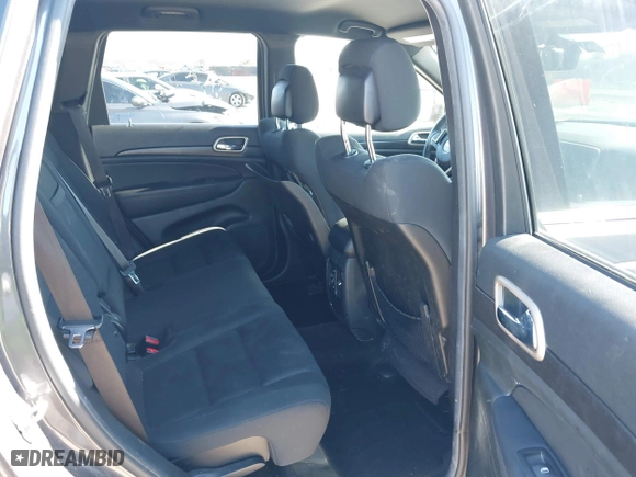 2014 Jeep Grand Cherokee Laredo with VIN 1C4RJEAG4EC317072, listed as a IAAI auction lot 41476862 with 127,742 mi miles. Bid and sale history available at carsss.com. Image 8.