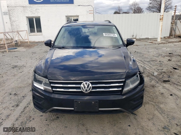 2018 Volkswagen Tiguan S with VIN 3VV1B7AXXJM105874, listed as a Copart auction lot 86565734 with 100,901 mi miles and Salvage Title. Bid and sale history available at carsss.com. Image 5.