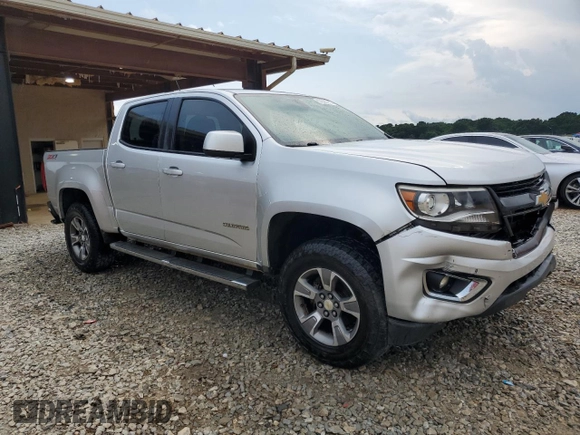 2015 Chevrolet Colorado 4WD Z71 with VIN 1GCGTCE35F1241212, listed as a Copart auction lot 57625975 with 195,988 mi miles and Salvage title. Bid and sale history available at DreamBid. Image 4.