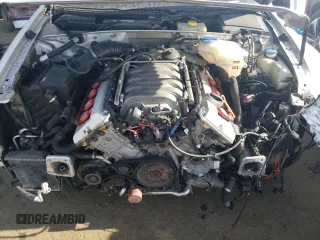 2004 Audi S4 z VIN WAUPL68E64A102859, wystawiony jako Copart lot #72573904 z przebiegiem 118 068 mil mil oraz Szkody całkowita. Historia ofert i sprzedaży dostępna na DreamBid. Obrazek 13.
