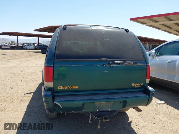 1996 Oldsmobile Bravada z VIN 1GHDT13W5T2711291, wystawiony jako IAAI lot #42502672 z przebiegiem 219 062 mil mil oraz . Historia ofert i sprzedaży dostępna na DreamBid. Obrazek 13.