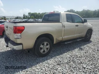 2010 Toyota Tundra с VIN 5TFRY5F14AX093529, выставлен на аукционе Copart как лот 60121455 с пробегом 174 997 миль миль и Списание • Salvage title. История ставок и продаж доступна на DreamBid. Изображение 3.