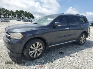 2013 Dodge Durango Crew with VIN 1C4RDHDG3DC613977, listed as a Copart auction lot 60570485 with 249,370 mi miles and Salvage title. Bid and sale history available at DreamBid. Image 1.