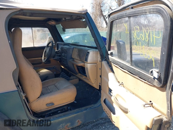 1997 Jeep Wrangler Sport with VIN 1J4FY19S1VP426589, listed as a IAAI auction lot 41865628 with 171,770 mi miles and . Bid and sale history available at DreamBid. Image 5.