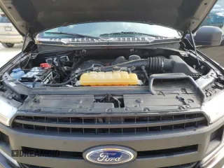 2018 Ford F-150 XL with VIN 1FTEX1CB0JFB12963, listed as a Copart auction lot 51076365 with 107,086 mi miles and Salvage Title. Bid and sale history available at carsss.com. Image 11.
