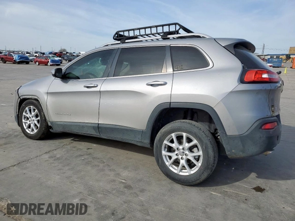 2015 Jeep Cherokee Latitude with VIN 1C4PJLCB4FW539933, listed as a Copart auction lot 49558245 with 142,828 mi miles and Salvage Title. Bid and sale history available at carsss.com. Image 2.