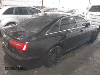 2012 Audi A6 3.0T Prestige with VIN WAUBGAFC1CN025117, listed as a IAAI auction lot 42027261 with 162,490 mi miles. Bid and sale history available at carsss.com. Image 4.