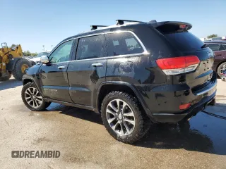 2017 Jeep Grand Cherokee Overland with VIN 1C4RJFCTXHC778491, listed as a Copart auction lot 73944594 with 99,235 mi miles and Clean Title. Bid and sale history available at carsss.com. Image 2.