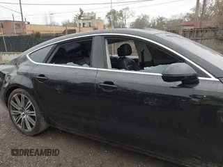 2012 Audi A7 Premium Plus with VIN WAUYGAFC0CN096027, listed as a IAAI auction lot 40881391 with 155,433 mi miles and . Bid and sale history available at DreamBid. Image 17.