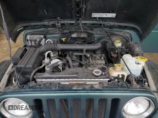 1999 Jeep Wrangler Sahara with VIN 1J4FY49S0XP435949, listed as a Copart auction lot 44937625 with 104,378 mi miles and Salvage Title. Bid and sale history available at carsss.com. Image 11.