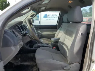 2014 Toyota Tacoma with VIN 5TFPX4EN7EX020878, listed as a Copart auction lot 60855484 with 164,643 mi miles and Clean Title. Bid and sale history available at carsss.com. Image 7.