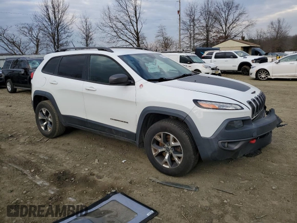 2015 Jeep Cherokee Trailhawk z VIN 1C4PJMBB1FW528766, wystawiony jako Copart lot #46879355 z przebiegiem 248 676 mil mil oraz Szkoda całkowita • Salvage title. Historia ofert i sprzedaży dostępna na DreamBid. Obrazek 4.