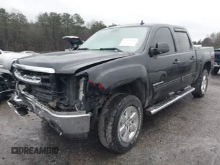 2011 GMC Sierra 1500 SLT with VIN 3GTP2WE37BG277399, listed as a IAAI auction lot 41057460 with 174,949 mi miles and . Bid and sale history available at DreamBid. Image 2.