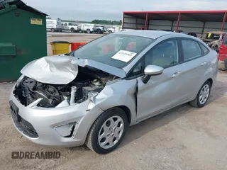 2013 Ford Fiesta S with VIN 3FADP4AJ9DM177022, listed as a IAAI auction lot 42535909 with 174,631 mi miles and . Bid and sale history available at DreamBid. Image 2.