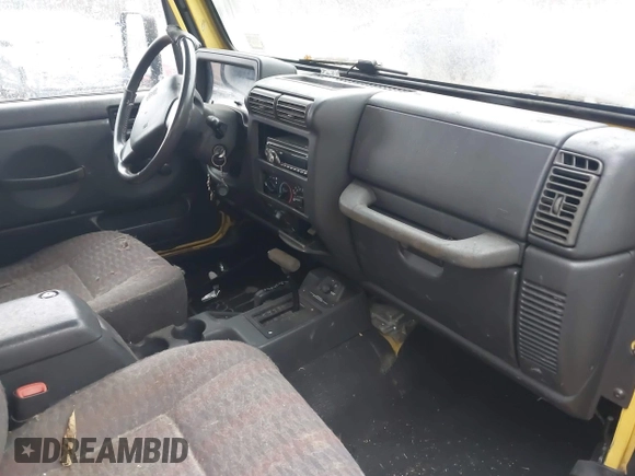 2000 Jeep Wrangler Sport with VIN 1J4FA49S4YP763414, listed as a IAAI auction lot 41478005 with 222,012 mi miles and . Bid and sale history available at DreamBid. Image 5.