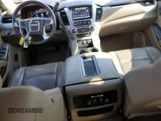 2017 GMC Yukon SLT with VIN 1GKS1BKC9HR362459, listed as a Copart auction lot 68303984 with 136,633 mi miles and Salvage Title. Bid and sale history available at carsss.com. Image 8.