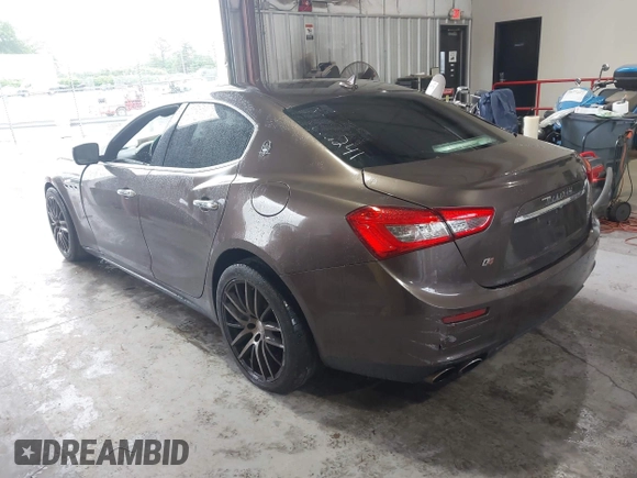 2015 Maserati Ghibli S Q4 with VIN ZAM57RTA3F1146241, listed as a IAAI auction lot 42251953 with 133,411 mi miles and . Bid and sale history available at DreamBid. Image 14.