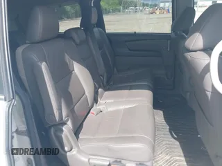 2012 Honda Odyssey EX-L with VIN 5FNRL5H63CB117341, listed as a IAAI auction lot 42197815 with 256,544 mi miles and . Bid and sale history available at DreamBid. Image 8.
