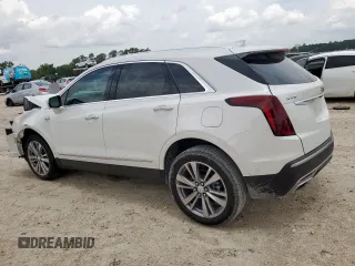 2024 Cadillac XT5 FWD Premium Luxury with VIN 1GYKNCRS9RZ706158, listed as a Copart auction lot 60455055 with 7,999 mi miles and Salvage title. Bid and sale history available at DreamBid. Image 2.