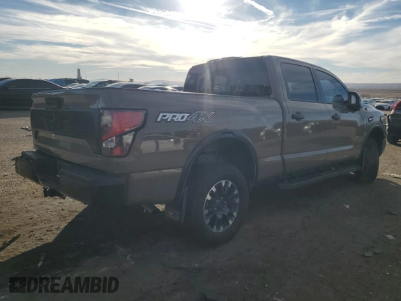 2021 Nissan Titan SV z VIN 1N6AA1FB9MN533034, wystawiony jako Copart lot #81335494 z przebiegiem 71 281 mil mil oraz Szkoda całkowita • Salvage title. Historia ofert i sprzedaży dostępna na DreamBid. Obrazek 3.
