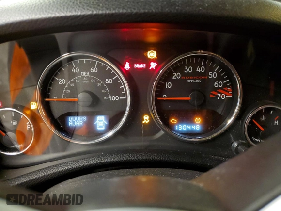 2013 Jeep Wrangler Rubicon with VIN 1C4HJWCG6DL666540, listed as a Copart auction lot 79337404 with 130,448 mi miles and Salvage title. Bid and sale history available at DreamBid. Image 9.