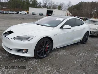 2020 Tesla Model S Long Range with VIN 5YJSA1E27LF370700, listed as a IAAI auction lot 41703463 with 26,024 mi miles and . Bid and sale history available at carsss.com. Image 2.