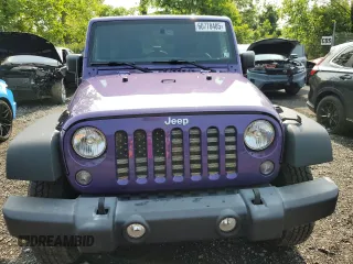 2018 Jeep Wrangler Unlimited Sport with VIN 1C4BJWDG9JL910410, listed as a Copart auction lot 60778405 with 57,450 mi miles and Salvage title. Bid and sale history available at DreamBid. Image 5.